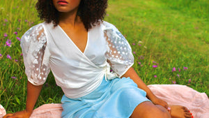 "SHE BLOOMS" WRAP TOP WITH PATTERNED ORGANZA PUFF SLEEVES WITH FLORAL AND POLKA DOT DETAIL IN WHITE